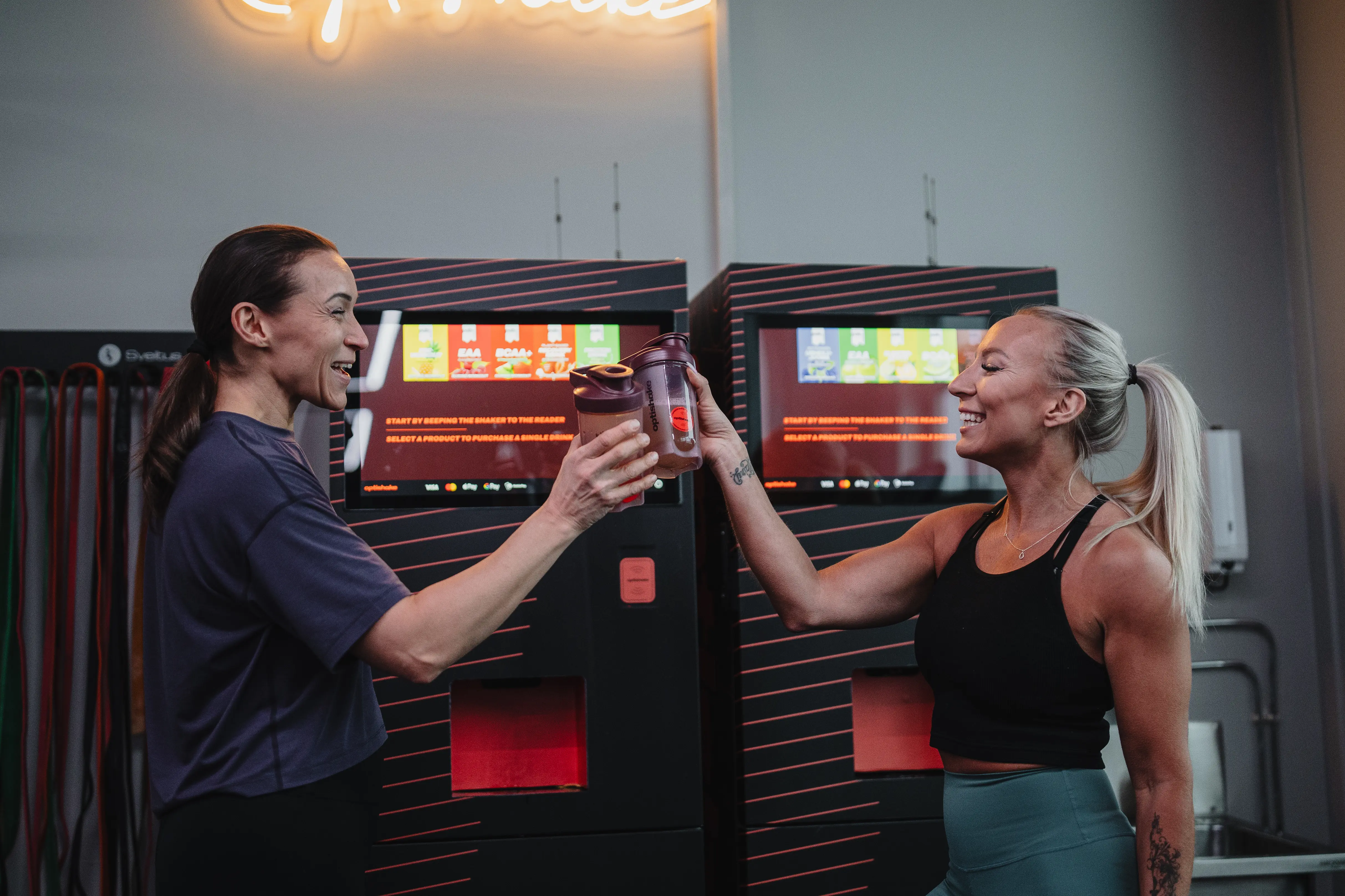 People enjoying Optishake drinks